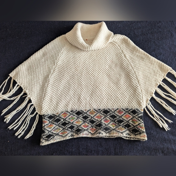 Chelsea & Violet Sweaters - Chelsea & Violet Cream and Black Patterned Poncho With Fringe